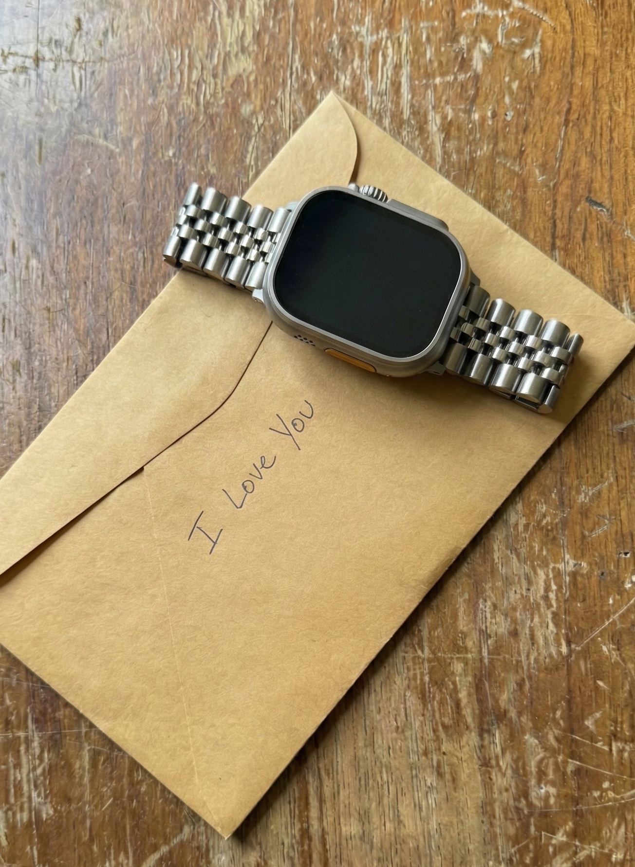Apple Watch on a handwritten envelope